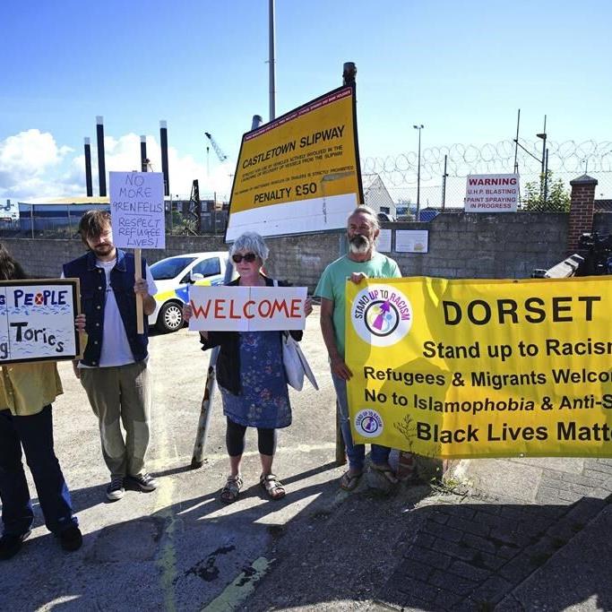 The UK government moves asylum-seekers to a barge moored off southern England in a bid to cut costs